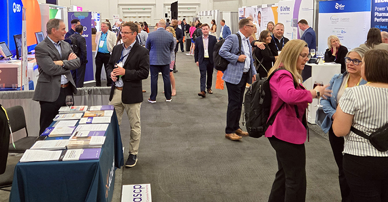 Engaged attendees and exhibitors at ASCP 2025